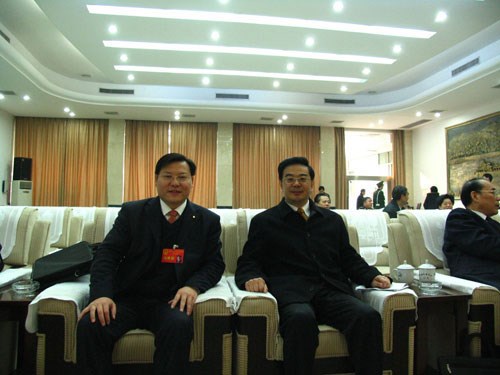 王董與最高人民法院院長、原湖南省省長周強在一起